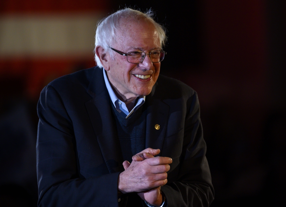 Bernie Sanders leaves the stage after speaking at a New Year's Eve campaign event on December 31, 2019 in Des Moines, Iowa.  Stephen Maturen/Getty Images/AFP