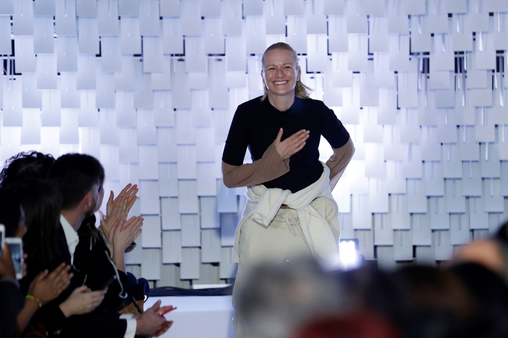 Yolanda Zobel acknowledges the audience at the end of the Courregs Women's Fall-Winter 2019/2020 Ready-to-Wear collection fashion show in Paris on February 27, 2019.  AFP / Thomas Samson 