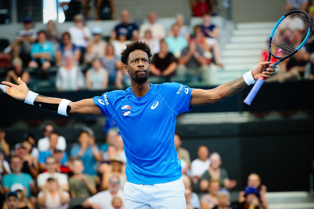 Gael Monfils of France reacts after winning against Cristian Garin of Chile during his men's singles match on day two of the ATP Cup tennis tournament in Brisbane on January 4, 2020. / AFP /  Patrick HAMILTON / 