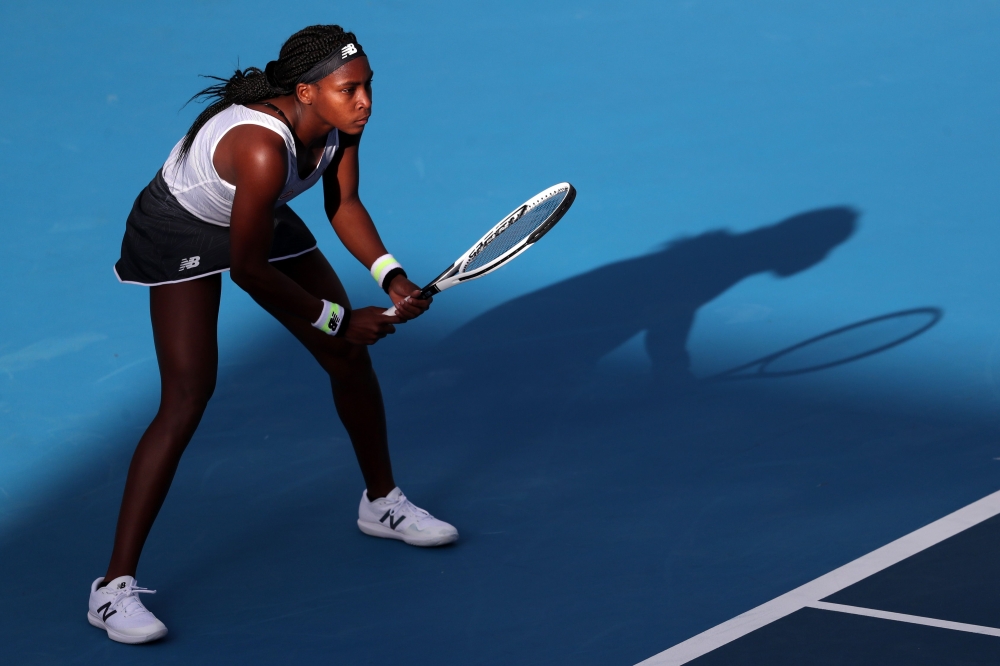 Cori Gauff of the US prepares to return serve against Viktoria Kuzmova of Slovakia during their women's singles first round match during the Auckland Classic tennis tournament in Auckland on January 6, 2020. AFP / Michael Bradley 
