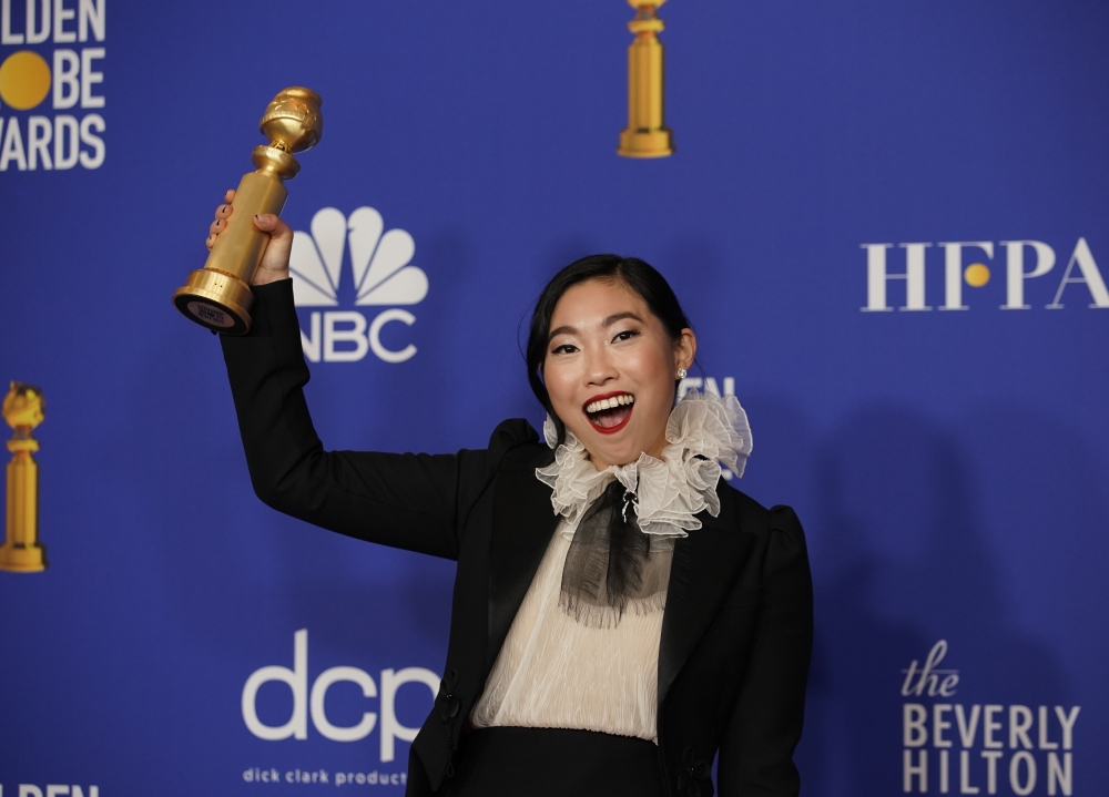 77th Golden Globe Awards - Photo Room - Beverly Hills, California, U.S., January 5, 2020 - Awkwafina poses backstage with her Best Performance by an Actress in a Motion Picture - Musical or Comedy award for