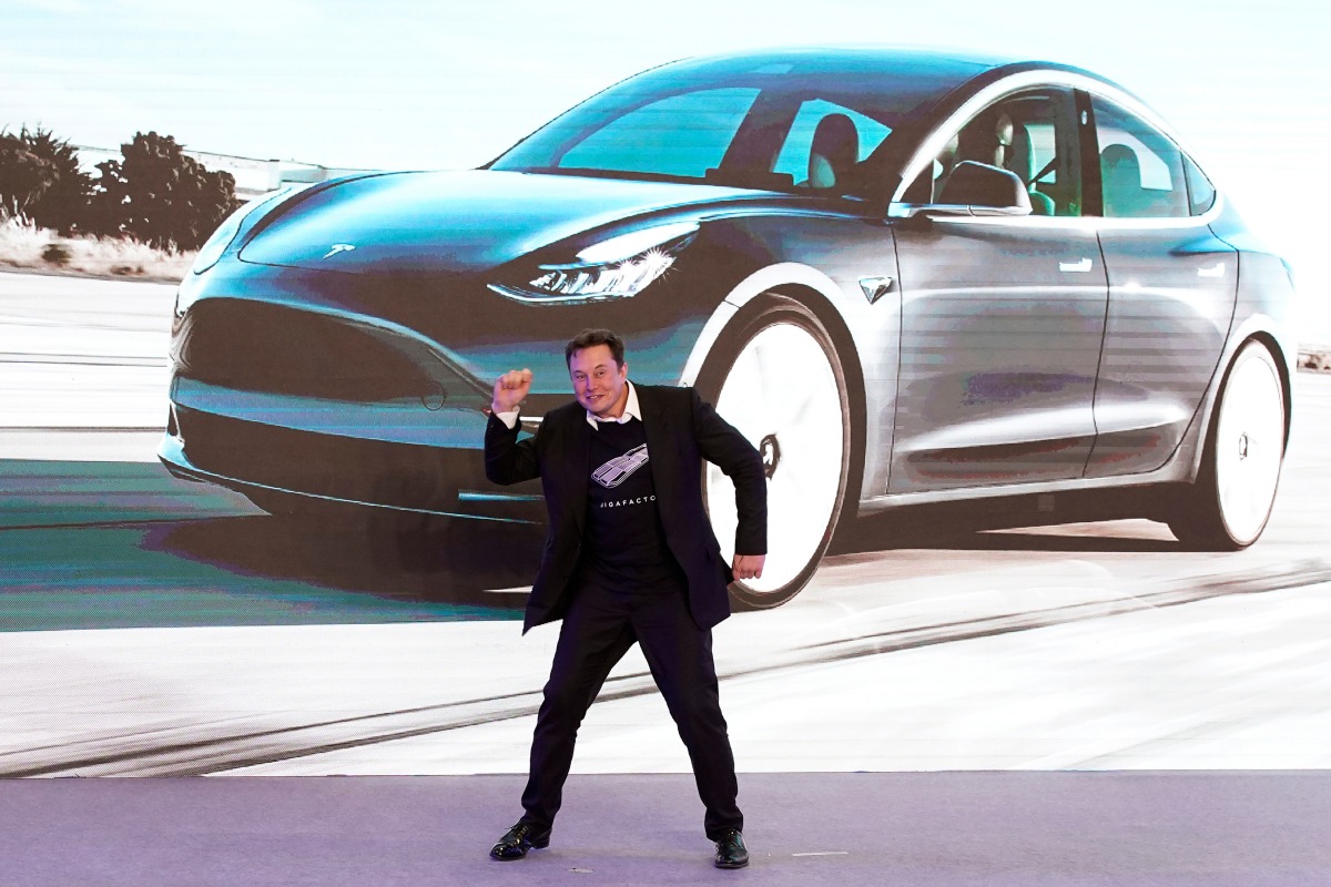 Tesla Inc CEO Elon Musk dances onstage during a delivery event for Tesla China-made Model 3 cars in Shanghai, China January 7, 2020. Reuters/Aly Song