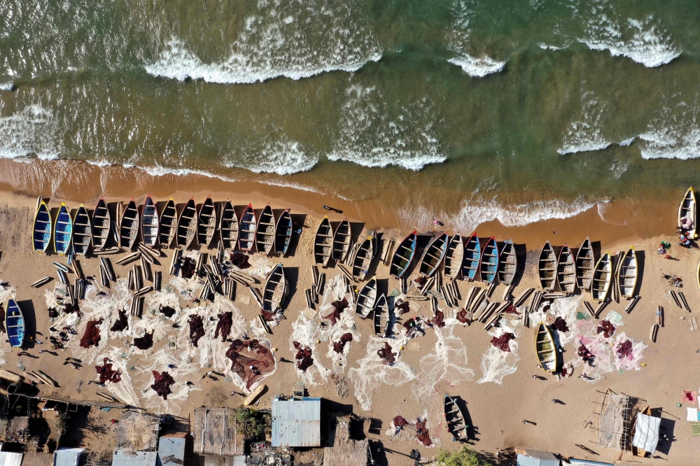 In this aerial view fishing boats are seen on the shore of the Lake Malawi at the Senga village on May 20, 2019 in Senga, Malawi. AFP / Gianluigi Guercia