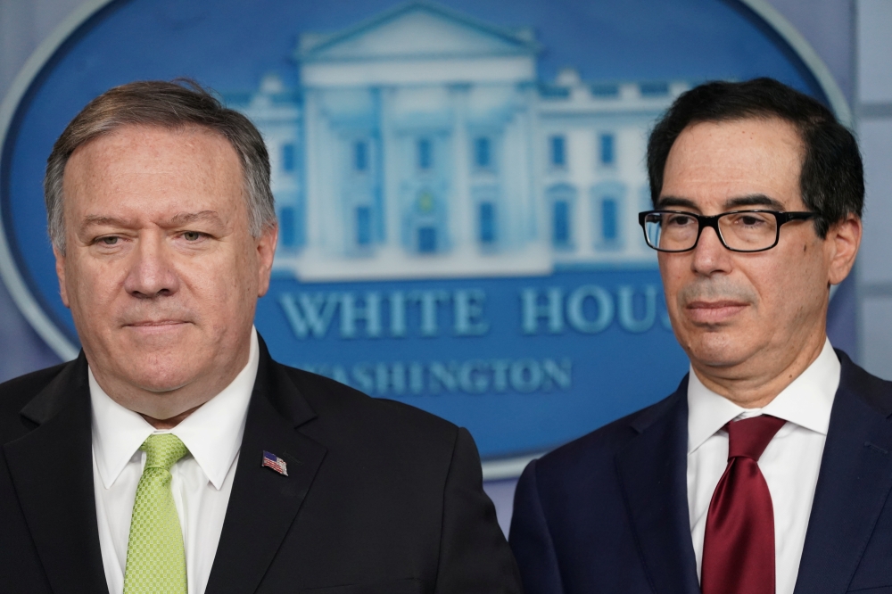 US Secretary of State Mike Pompeo and Treasury Secretary Steven Mnuchin announce new sanctions on Iran in the Brady Press Briefing Room of the White House in Washington, U.S., January 10, 2020. Reuters/Kevin Lamarque