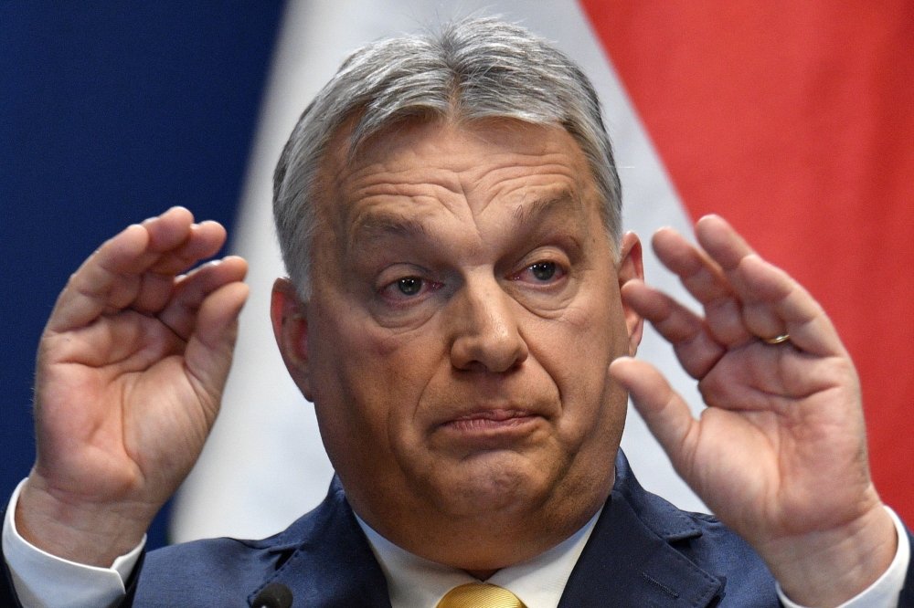 Hungarian Prime Minister Viktor Orban gestures during his traditional new year press conference at his new office, Buda Castle's Carmelita monastery, on January 9, 2020 in Budapest. AFP / Attila Kisbenedek 


