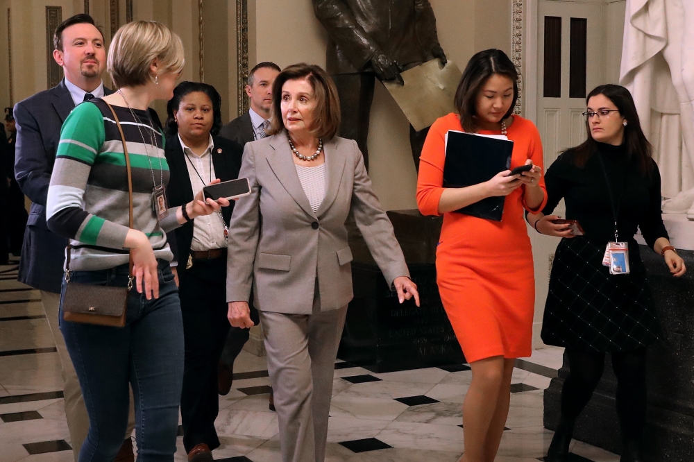 Speaker of the House Nancy Pelosi (D-CA) is questioned by reporters as she leaves the House Chamber at the U.S. Capitol January 10, 2020 in Washington, DC. Chip Somodevilla/Getty Images/AFP