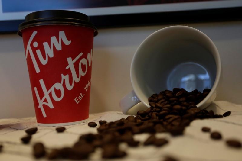 A Tim Hortons coffee cup and coffee beans are displayed at the coffee shop during a media event a day before its opening in San Pedro Garza Garcia, neighboring Monterrey, Mexico, October 26, 2017. Reuters/Daniel Becerril 