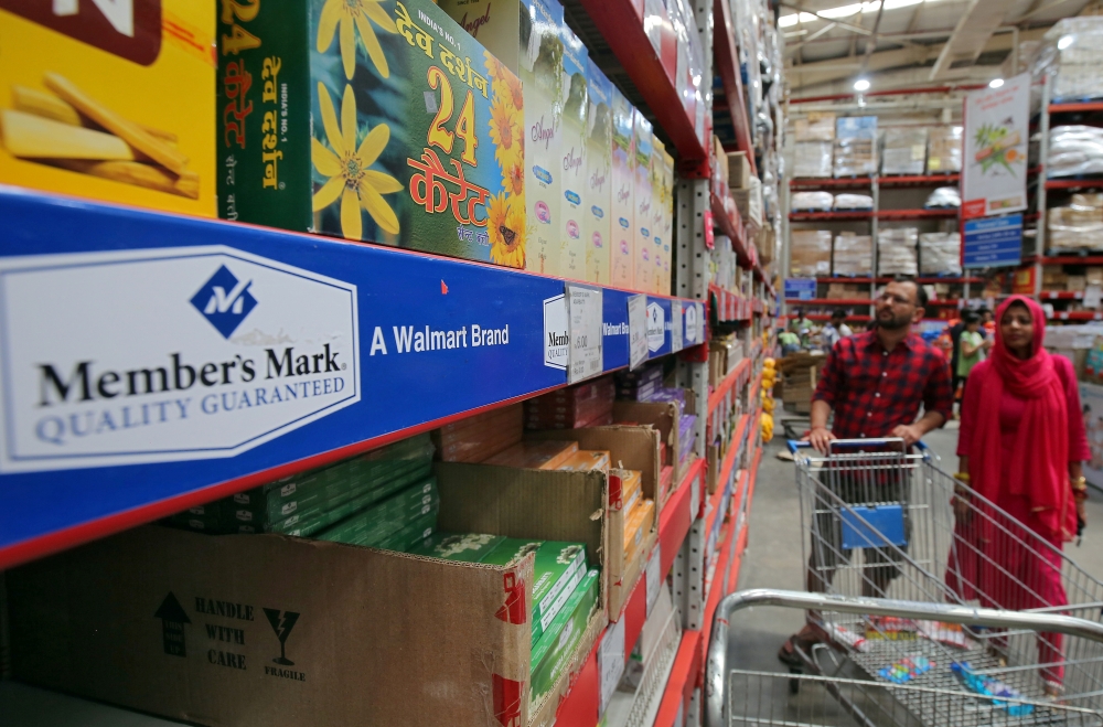 Customers shop at a walmart india's Best Price Modern Wholesale store in Jammu May 8, 2018. REUTERS/Mukesh Gupta/File Photo 
