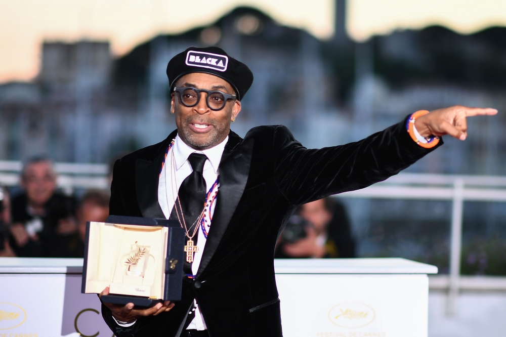(FILES) In this file photograph taken on May 19, 2018, US director Spike Lee poses with his trophy during a photocall after he won the Grand Prix for the film