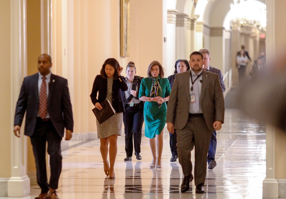 House Speaker Nancy Pelosi (D-CA) walks withstaff members at the U.S. Capitol in Washington, U.S., January 14, 2020. Reuters/Tom Brenner