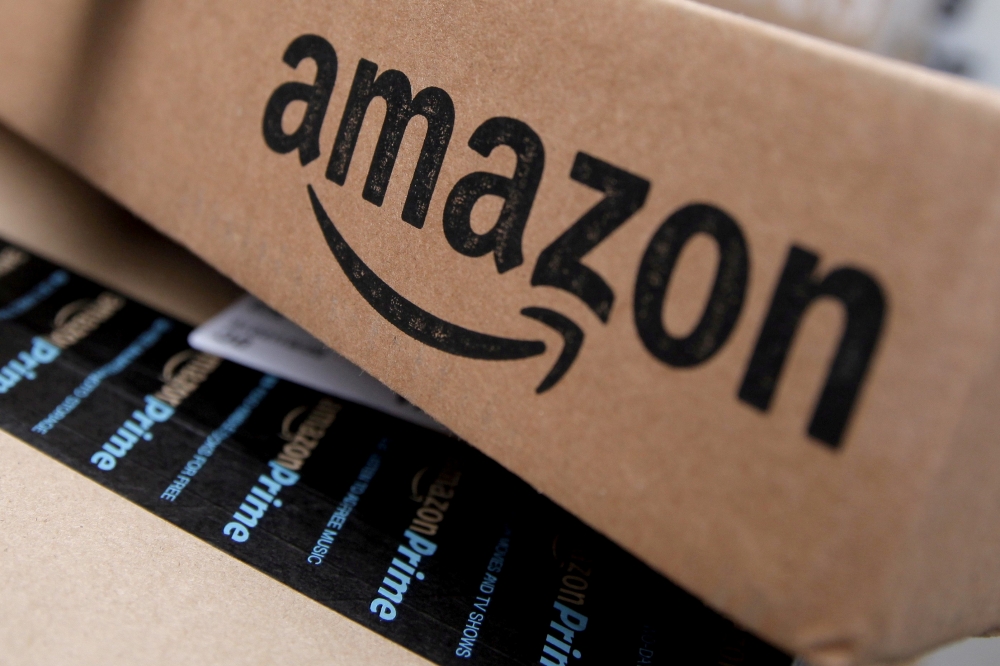 Amazon boxes are seen stacked for delivery in the Manhattan borough of New York City, January 29, 2016. REUTERS/Mike Segar/File Photo/File Photo 