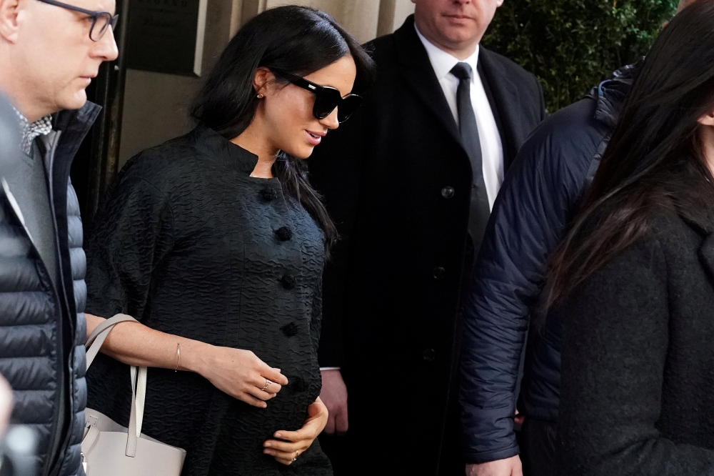 File photo: Meghan Markle, Duchess of Sussex, exits a hotel in the Manhattan borough of New York City, Feb 19, 2019. Reuters / Carlo Allegri 