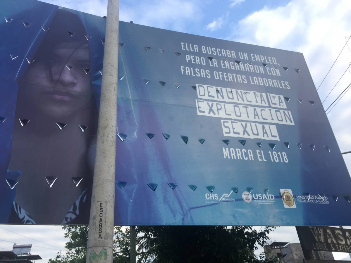 A poster warns of the dangers of false offers of work and child sexual exploitation, Puerto Maldonado, Peru. November 29, 2019. Thomson Reuters Foundation/Anastasia Moloney 
