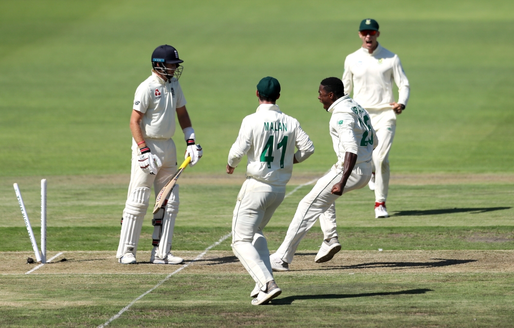South Africa v England - Third Test - St George's Park, Port Elizabeth, South Africa - January 16, 2020 South Africa's Kagiso Rabada celebrates taking the wicket of England's Joe Root REUTERS/Siphiwe Sibeko 