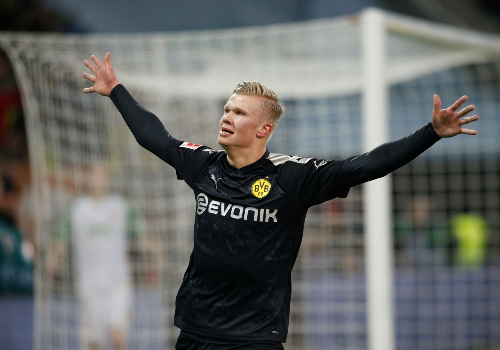 Borussia Dortmund's Erling Braut Haaland celebrates scoring their fifth goal to complete his hat-trick REUTERS/Michaela Rehle

