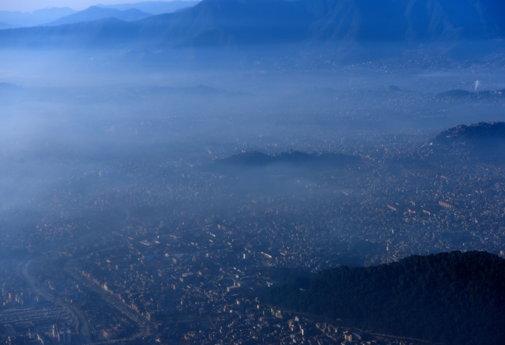 An aerial view shows Kathmandu Valley, the economic and political hub of Nepal, on January 20, 2020. / AFP / PRAKASH MATHEMA