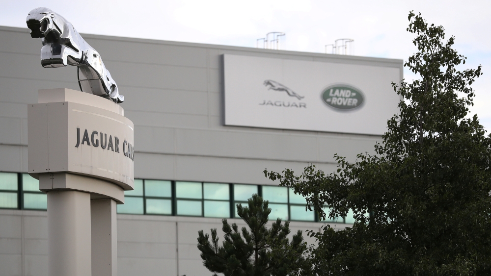 FILE PHOTO: Signs are seen outside the Jaguar Land Rover plant at Halewood in Liverpool, northern England, September 12 , 2016. REUTERS/Phil Noble
