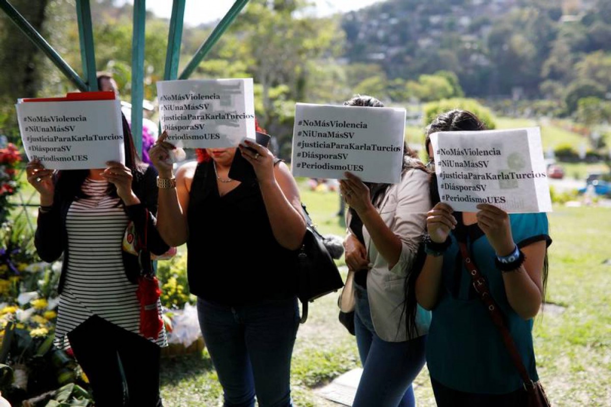 Women demonstrate during the funeral of Karla Turcios in San Salvador, El Salvador April 17, 2018. The signs read: 