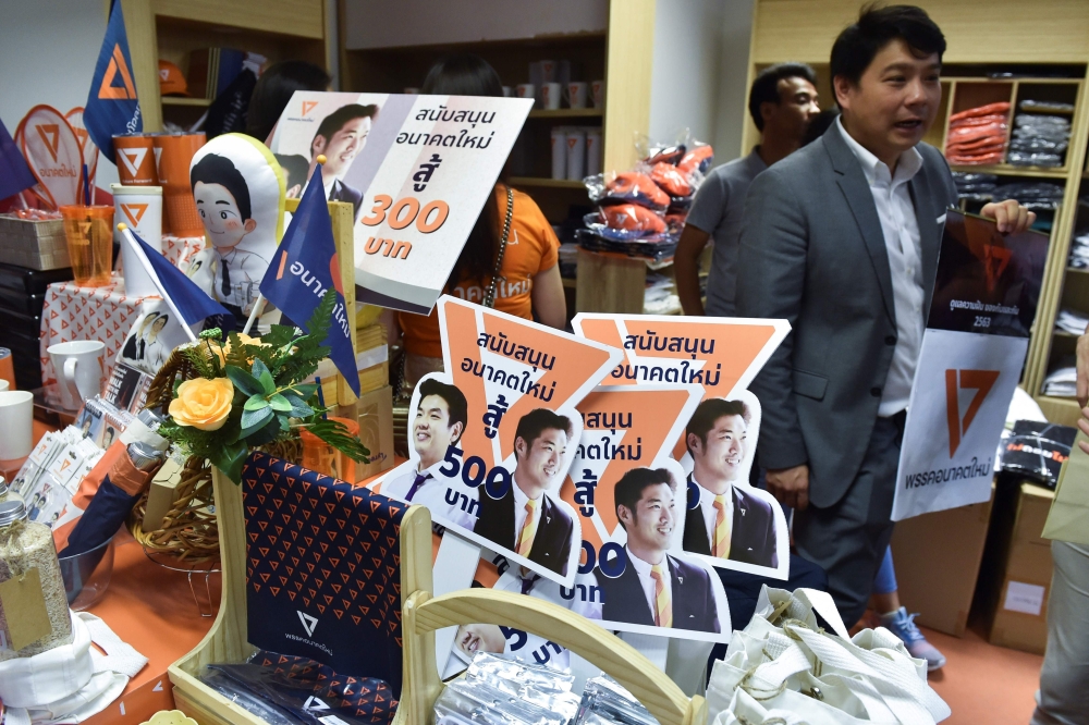 Souvenir items bearing images of Thanathorn Juangroongruangkit, leader of the opposition Future Forward party, are displayed at the party's headquarters in Bangkok on January 21, 2020. AFP / Romeo Gacad 
