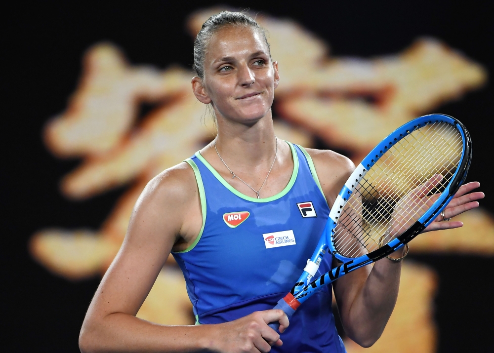 Czech Republic's Karolina Pliskova celebrates victory against Germany's Laura Siegemund during their women's singles match on day four of the Australian Open tennis tournament in Melbourne on January 23, 2020. / AFP / Manan VATSYAYANA /
