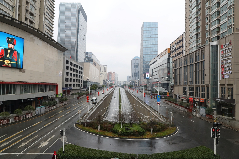 Street view after Wuhan government announced to ban non-essential vehicles in the downtown area to contain coronavirus outbreak, on the second day of the Chinese Lunar New Year, in Wuhan, Hubei province, China January 26, 2020. cnsphoto via REUTERS
