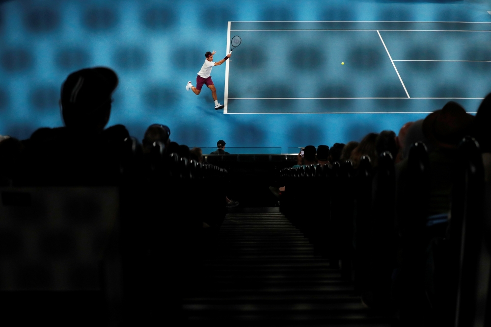 Switzerland's Roger Federer in action during his match against Hungary's Marton Fucsovics. REUTERS/Issei Kato