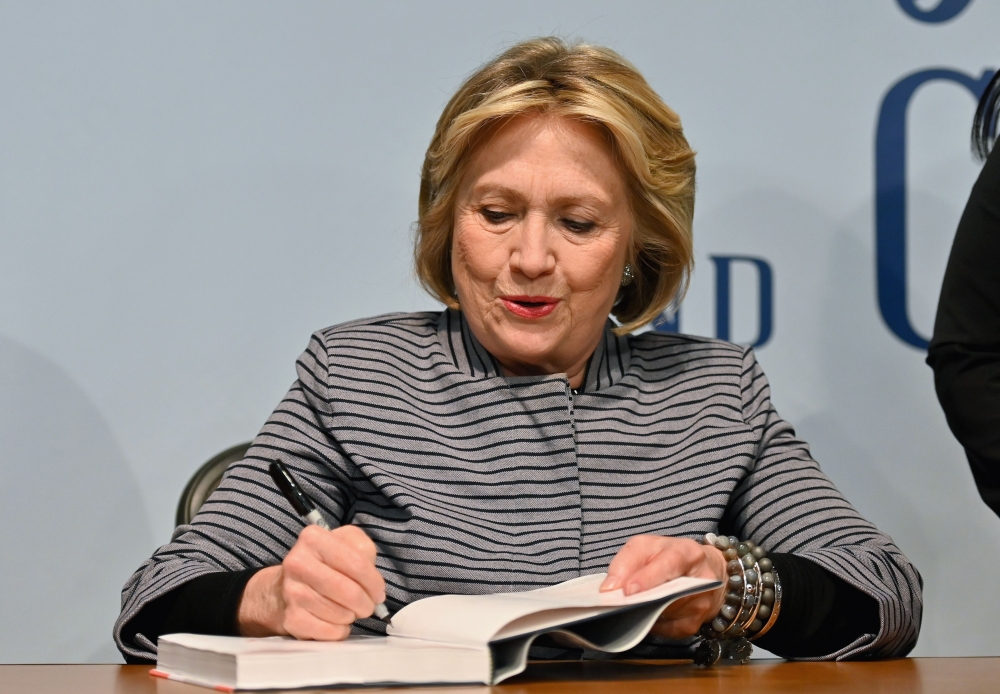 Hillary Clinton signs copies of ‘The Book of Gutsy Women: Favorite Stories for Courage and Resilience’ at Barnes & Noble Union Square in New York City on October 3, 2019. AFP / Angela Weiss 