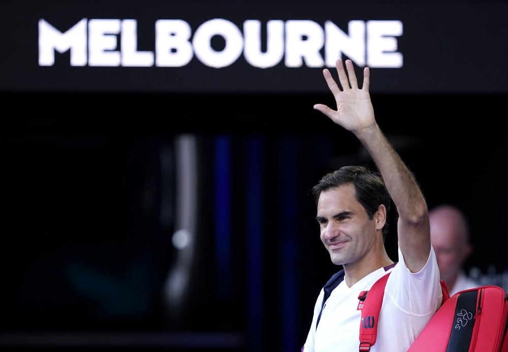 Switzerland’s Roger Federer waves as he leaves the court after winning his match against Tennys Sandgren of the U.S. REUTERS/Kim Hong-J