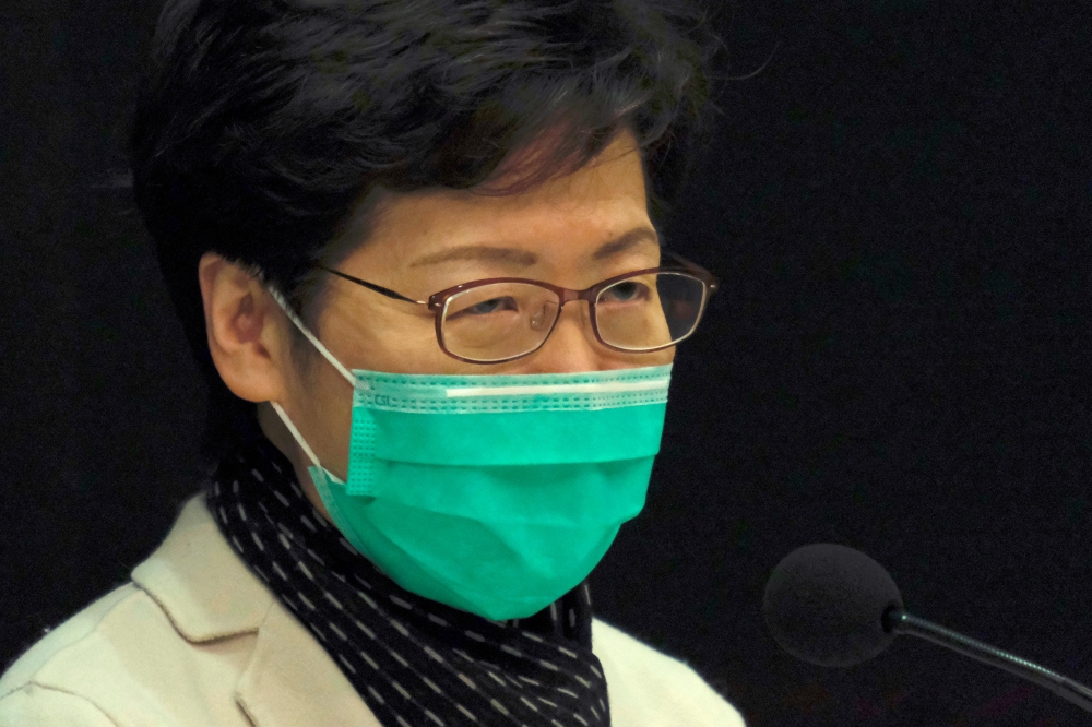 Hong Kong Chief Executive Carrie Lam wears a mask following the outbreak of a new corona virus during an news conference, in Hong Kong, China January 28, 2020. (REUTERS/Tyrone Siu)

