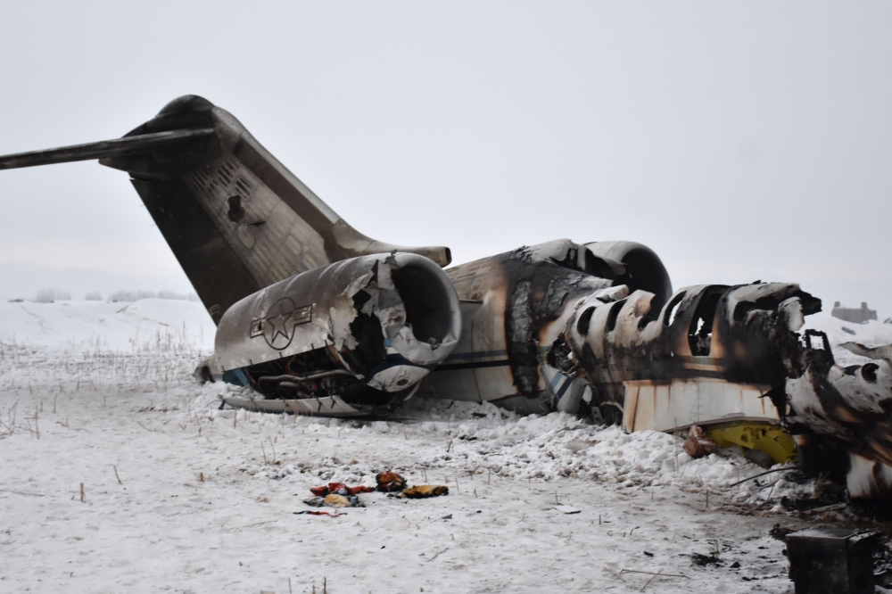 The wreckage of a US Bombardier E-11A jet is seen after it crashed in mountainous territory of Deh Yak district in Ghazni Province.   AFP 
