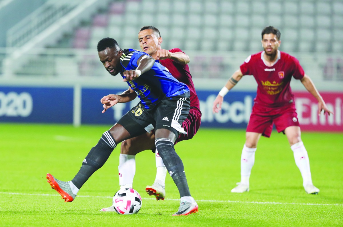 The players of Al Sailiya and Shahr Khodro vie for ball possession during the AFC Champions League play-off match in Doha yesterday.