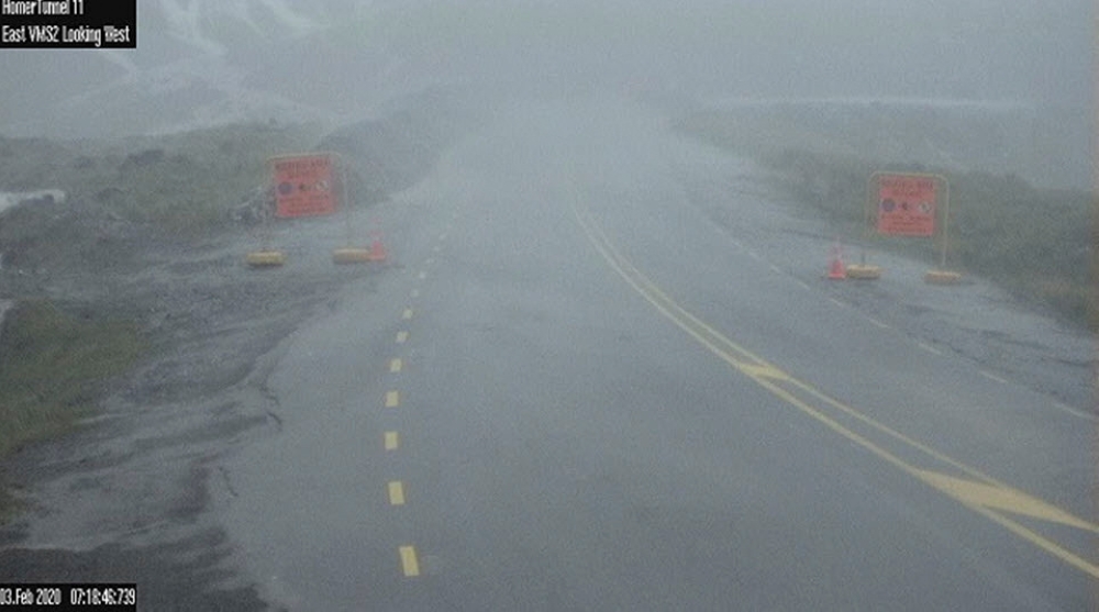 A closed road is seen in flood-affected Southland, New Zealand, February 3, 2020, in this image obtained via social media. New Zealand Transport Agency via REUTERS