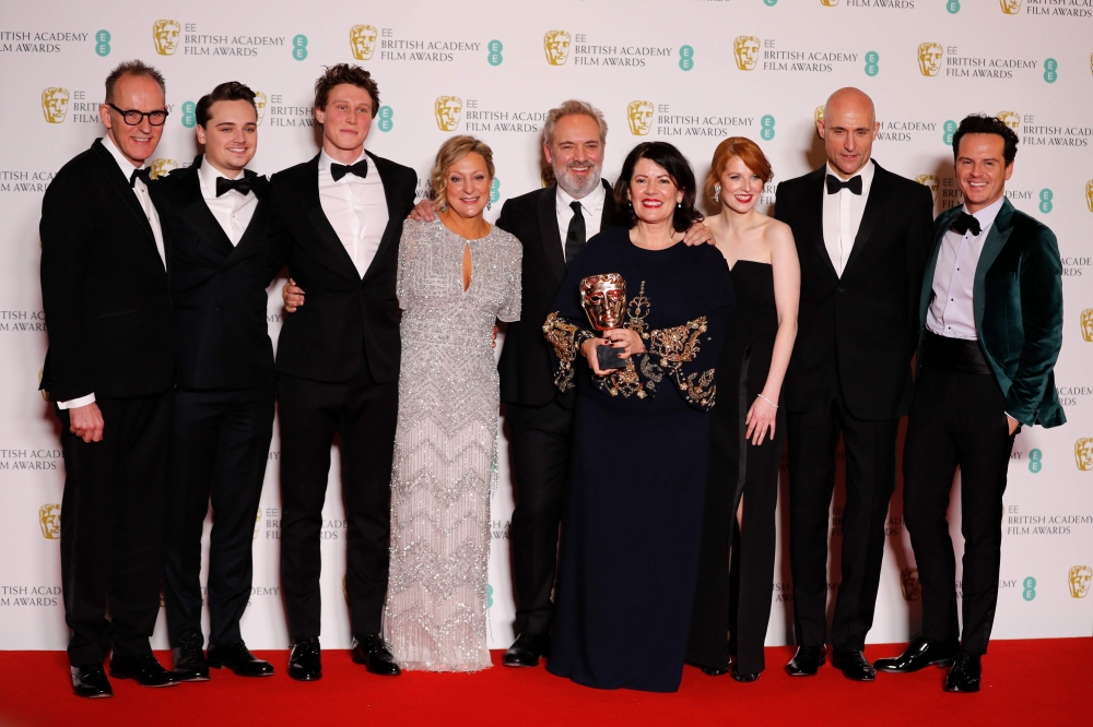 Pippa Harris, Callum McDougall, Sam Mendes, Jayne-Ann Tenggren pose with their award for Best Film for '1917' alongside Dean-Charles Chapman, George MacKay, Mark Strong, Krysty Wilson-Cairns and Andrew Scott at the British Academy of Film and Television