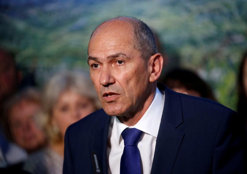Janez Jansa, leader of the Slovenian Democratic Party (SDS), speaks to the media and supporters after an election in Ljubljana, Slovenia, June 3, 2018. Reuters/Borut Zivulovic
