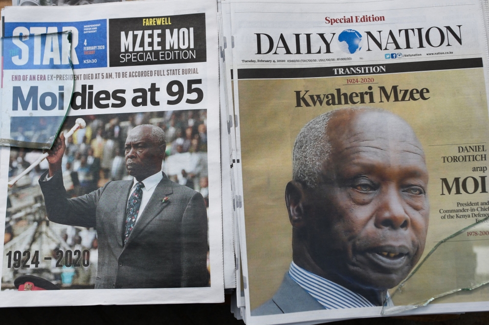 Newspapers with the headline on the death of former Kenya's president Daniel Arap Moi, are displayed, in Nairobi, on February 4, 2020. AFP / Simon Maina 