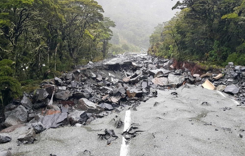 This handout picture taken on February 3, 2020 and released by the New Zealand Transport Agency shows a main highway evastated by the flood after severe flooding near Mataura in New Zealand's South Island. AFP PHOTO 