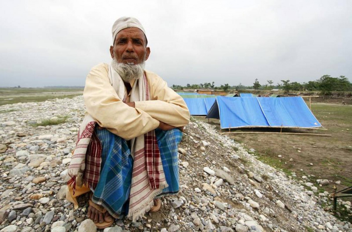 A villager from a Muslim community sits at a relief camp in Narayanguri village in Baksa district in the northeastern Indian state of Assam May 4, 2014. Reuters/Utpal Baruah