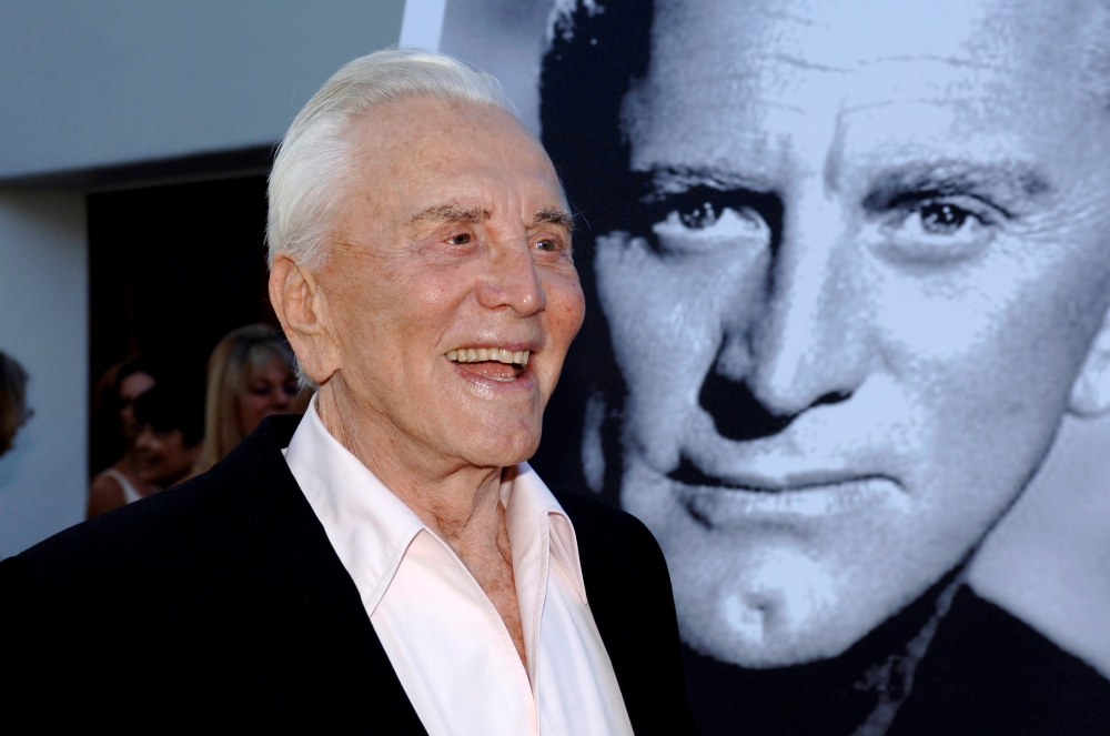 Kirk Douglas arrives to receive an inaugural award for Excellence in film presented by the Santa Barbara International Film Festival at a black-tie gala fundraiser in his honor at the Bacara Resort & Spa in Santa Barbara, California, July 30, 2006. Reuter