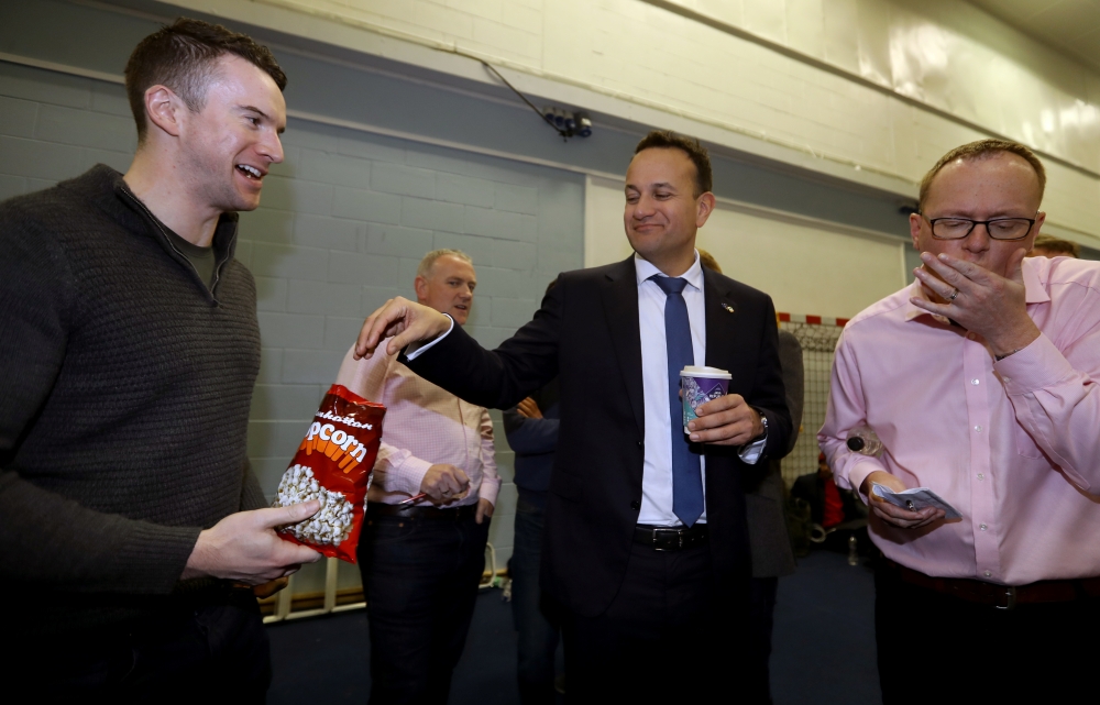 Irish Prime Minister Leo Varadkar grabs some popcorn as he waits at a count centre, during Ireland's national election, in Citywest, near Dublin, Ireland, February 9, 2020. Reuters/Lorraine O'Sullivan 