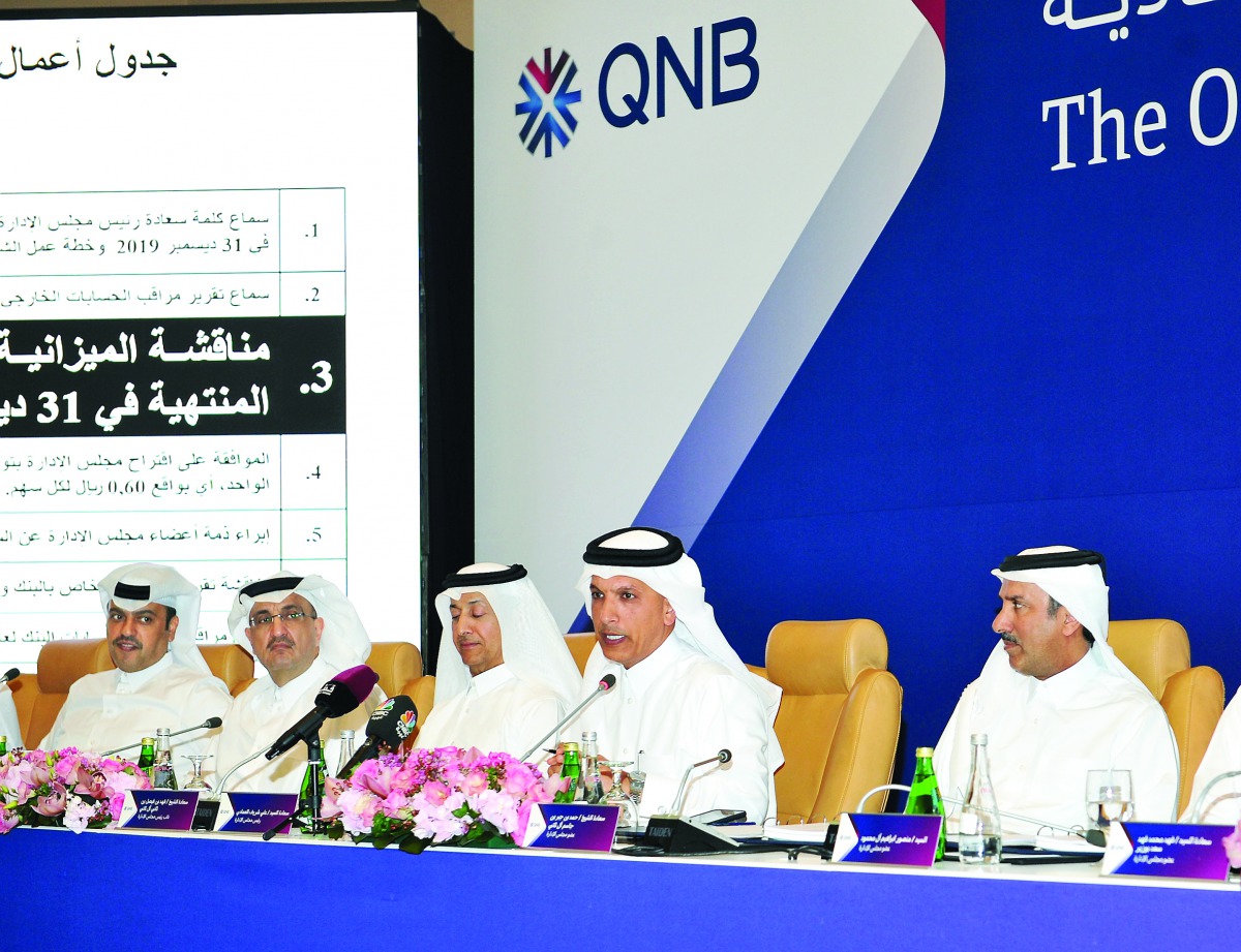 H E Ali bin Shareef Al Emadi (second right), Chairman of QNB Group, who is also the Minister of Finance, addressing the AGM of the bank at Sharq Village and Spa, in Doha yesterday, as Deputy Chairman Sheikh Fahad bin Faisal Al Thani (third left); Group CE