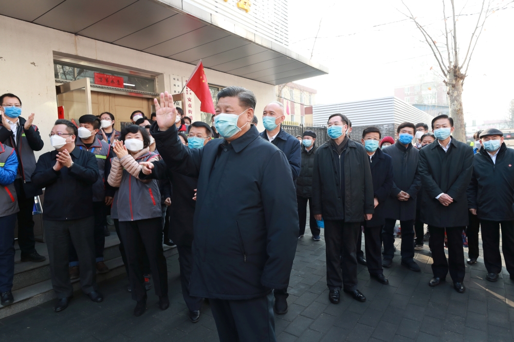 Chinese President Xi Jinping inspects the novel coronavirus prevention and control work at Anhuali Community in Beijing, China, February 10, 2020.