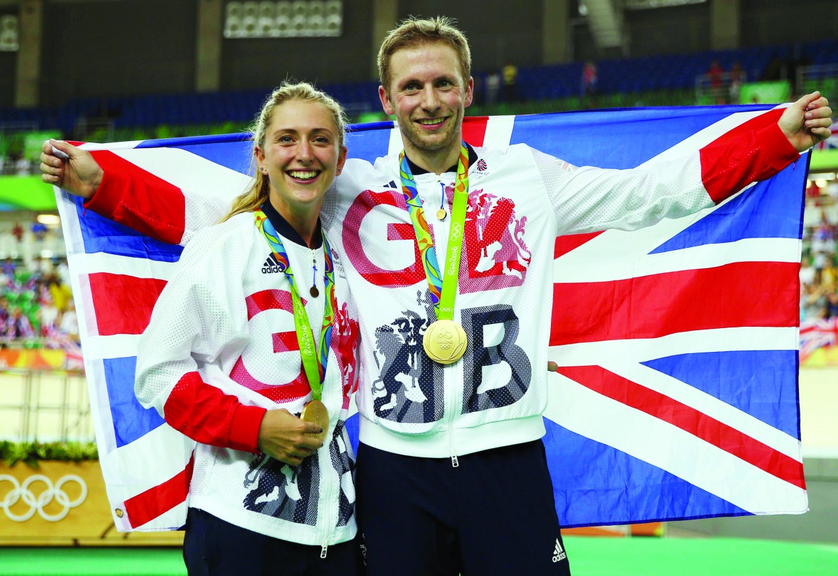 Gold medalist Jason Kenny (GBR) of Britain poses with his gilfriend, women's omnium gold medalist Laura Trott (GBR) of Britain. Reuters/Matthew Childs 