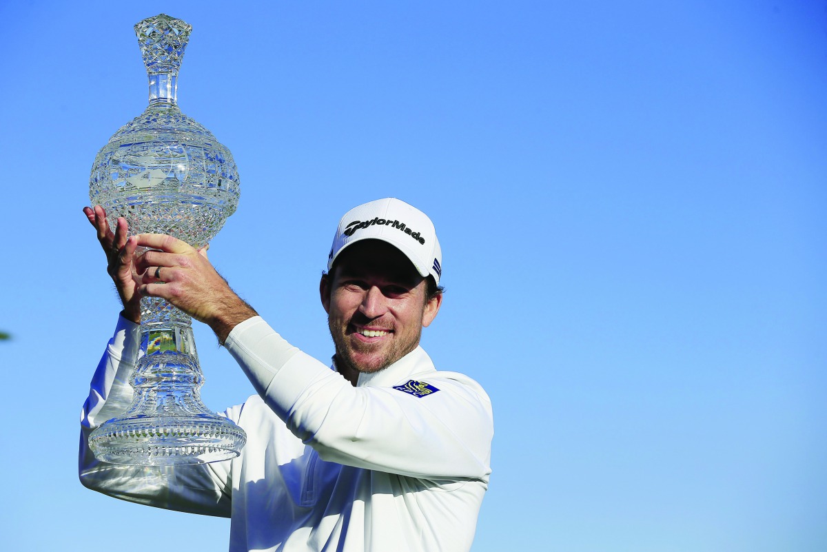 Nick Taylor of Canada poses with the trophy after winning the AT&T Pebble Beach Pro-Am at Pebble Beach Golf Links on February 09, 2020 in Pebble Beach, California. Chris Trotman/Getty Images/AFP