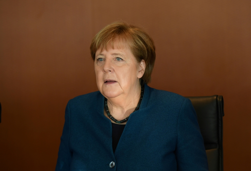 FILE PHOTO: German Chancellor Angela Merkel arrives for the weekly cabinet meeting at the Chancellery in Berlin, Germany, February 5, 2020. REUTERS/Annegret Hilse/File Photo