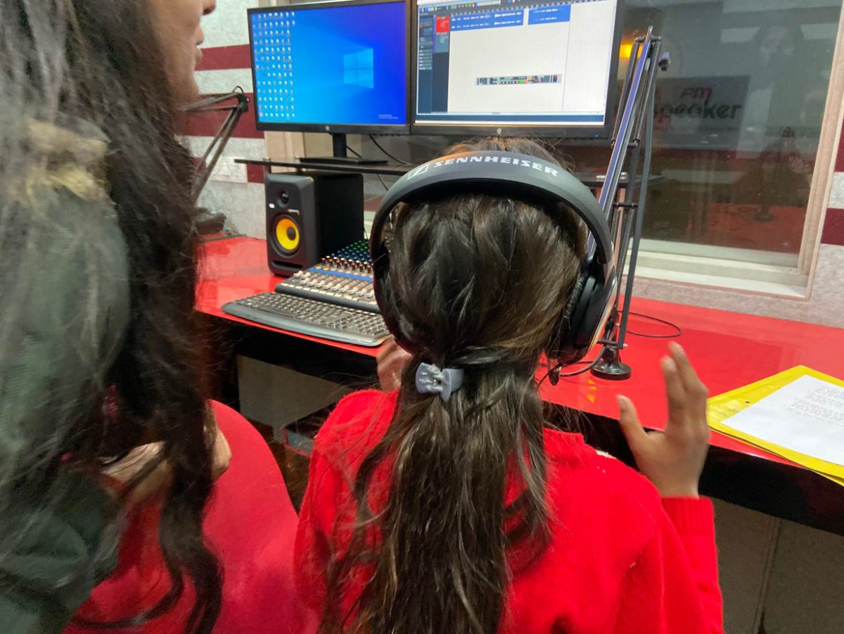 A child speaks on a radio show on child workers in Gorakhpur, India, Feb 5, 2020. Thomson Reuters Foundation/Roli Srivastava