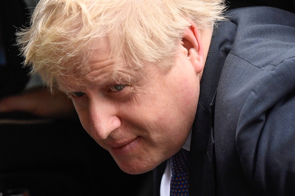 Britain's Prime Minister Boris Johnson arrives at Downing Street in London, Britain February 13, 2020. REUTERS/Toby Melville