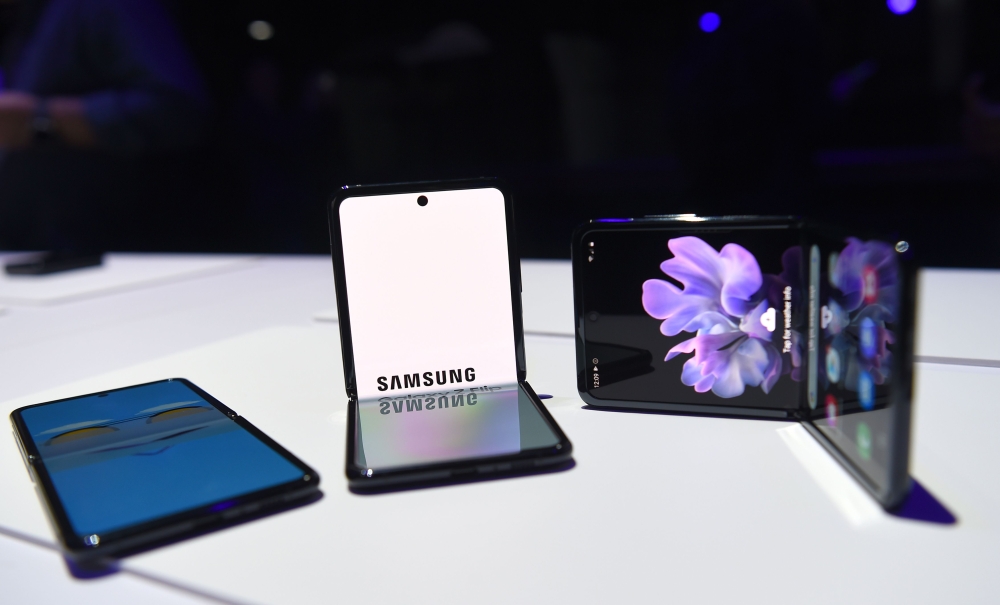 Samsung Galaxy Z Flip phones are seen on display during the Samsung Galaxy Unpacked 2020 event in San Francisco, California on February 11, 2020. Samsung unveiled its second folding smartphone, a 