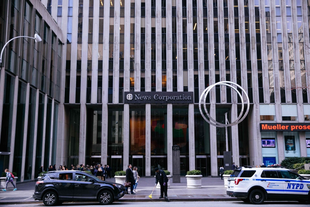 The News Corporation building on 6th Avenue, home to Fox News, the New York Post and the Wall Street Journal,is seen in New York City on March 20, 2019. AFP / Getty Images North America / Kevin Hagen