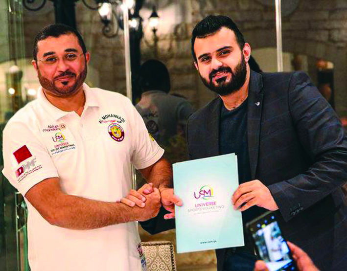 Qatari driver Khalid Al Mohannadi (left) with Zaid Yaaroub, Marketing Director of Universe Sports Marketing. 
