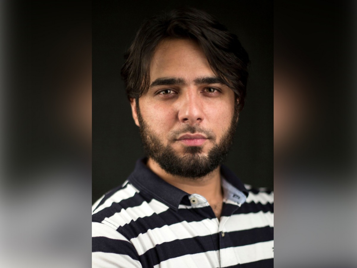 This handout photo taken on October 2019 and received courtesy of Ahmer Khan by AFP on February 19, 2020, shows freelance reporter Ahmer Khan posing in New Delhi. AFP PHOTO / Courtesy of Ahmer Khan and Siddharth Bokolia